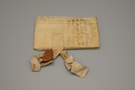 Official document written on parchment with attached wax sealing