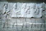 K.045 Medes Carrying a Vase, Bowls, Dagger and Rings, Delegation 1, Eastern Stairway by Denis Baly