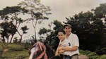 Rene, Betanias brother as a child, sits on a horse with Tio Rene (2011) by Betania Escobar