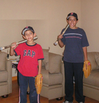 Roberto and Luis, his brother, after baseball practice by Roberto Vasquez