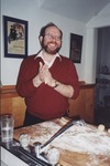 Michael Cooper, Director of Hillel, baking challah for the Sabbath dinner. by Sarah Schwenk