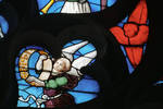 Sens Cathedral, St. Stephen's Cathedral, Angelic Musician Plays Tambourine, detail of north transept rose window, Flamboyant Gothic stained glass, early 16th century, France. by Stuart Henry Rosenberg