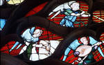 Sens Cathedral, St. Stephen's Cathedral, Angelic Musician Plays Organ and Lute, detail of north transept rose window, Flamboyant Gothic stained glass, early 16th century, France. by Stuart Henry Rosenberg