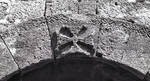 Banos de Cerrato, San Juan, Palencia, Spain, west facade, decorated cross on the keystone of the entry arch by William J. Smither