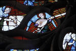 Sens Cathedral, St. Stephen's Cathedral, Angelic Musician Plays Lute, detail of north transept rose window, Flamboyant Gothic stained glass, early 16th century, France. by Stuart Henry Rosenberg