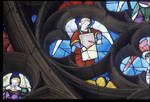 Sens Cathedral, St. Stephen's Cathedral, Angelic Musician Plays Organ, detail of north transept rose window, Flamboyant Gothic stained glass, early 16th century, France. by Stuart Henry Rosenberg