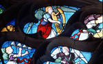 Sens Cathedral, St. Stephen's Cathedral, Angelic Musician Plays Harp, detail of north transept rose window, Flamboyant Gothic stained glass, early 16th century, France. by Stuart Henry Rosenberg