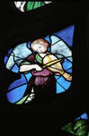 Sens Cathedral, St. Stephen's Cathedral, Angelic Musician Plays Viol, detail of north transept rose window, Flamboyant Gothic stained glass, early 16th century, France. by Stuart Henry Rosenberg