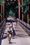 Two bikers cross the bridge on the Kokosing Gap Trail