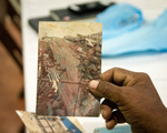 Santos Cruz showing us photographs of his restoration work at Uxmal March 7, 2018