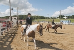 Knox County Fair, Equestrian Event, Young Girl Riding in the Corral by Daniel P. Younger