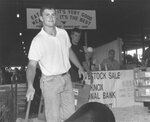 Knox County Fair #22: Displaying a Hog at the Junior Livestock Fair (Sam Fawcett, Joe Duncan) by Daniel P. Younger